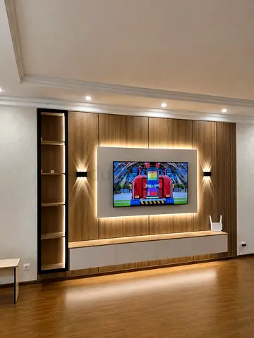 Custom built-in TV entertainment wall unit with LED lighting and storage