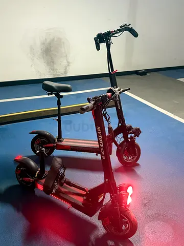 Dual Electric Scooter — foldable with seat, good working condition