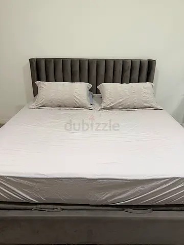 bed and mirrors