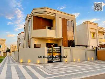 Luxury villa for sale in Al Yasmin with a modern design and high-end finishes, including air condit