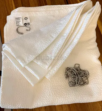 Crate & Barrel shower curtain and 12 rings plus shower accessories