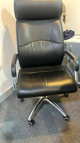 Black leather Mangerial and executive office chair with headrest and footrest - good condition