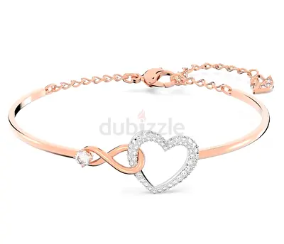 Rose gold heart bangle bracelet with crystal accents