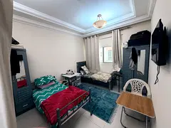 Bed space available in barsha 1 . Total people in apartment 3 people   . Behind city max and mall of