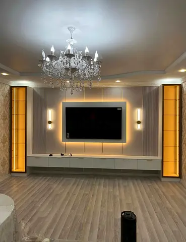 Modern built-in entertainment wall unit with LED lighting