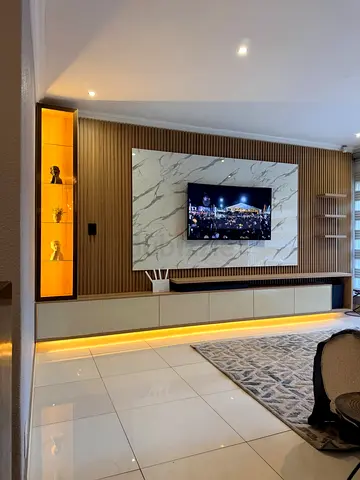 Modern built-in TV entertainment wall unit with LED lighting