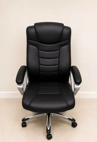 Black high-back executive office chair with armrests