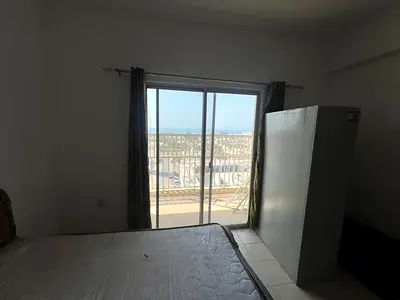 Captivating Sea View | 2 Bedrooms & Living Room | Spacious Layout | Central AC | Al Rumailah