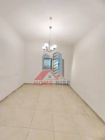 Faimly Living Brand New 2BHK With Wardrobes Balcony Free Parking Near Al Nahda Park Sharjah.