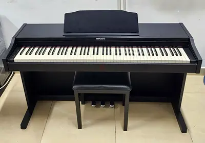 The Roland RP102 is an affordable, 88-key digital home piano featuring an authentic weighted PHA-4