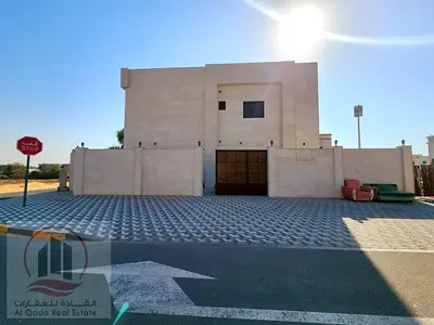 Villa for sale in Ajman, Al Zahiyah, 5 master bedrooms, majlis, living room, and maid's room. Freehold ownership for all nationalities.