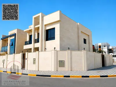 Villa for sale in Ajman, Al Zahiyah, 5 master bedrooms, majlis, living room, and maid's room. Freehold ownership for all nationalities.