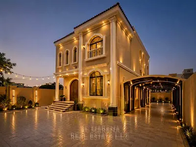 Two-story villa with a rooftop terrace in Al Rawda, price includes electricity, water, and air conditioning. First occupancy, located on the main stre