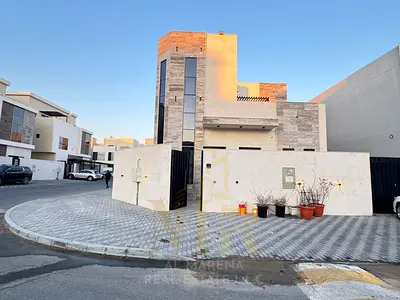For Sale: A distinctive corner villa in Al Helio, Ajman, close to the mosque and all essential services. Featuring a sophisticated architectural desig