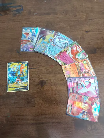 15 peices of rare holographic Pokémon trading cards - V and EX assortment