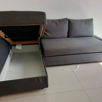 Grey L-shaped Storage Sofa Bed with Cushions - Good Condition