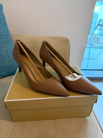 Beige women's leather pointed-toe heels, new Michael kors original price aed 625 selling aed 75