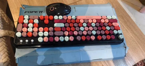 Wireless keyboard and mouse combo with colorful round keys