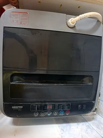 Washing Machine for sale in good working condition with active warranty
