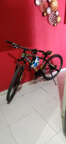 Used adult mountain bike with helmet - good condition