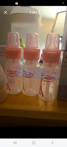 Three original Dr. Brown's milk bottles