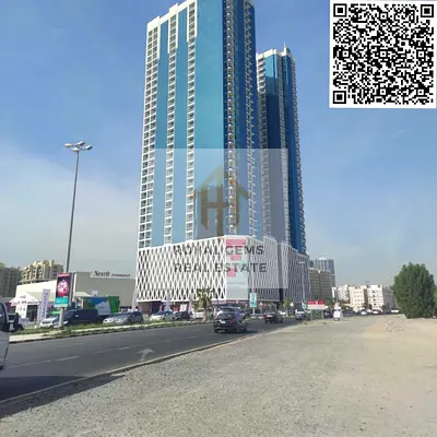 For Sale: Two-Bedroom Apartment with a Living Room in Al Waha Towers – Investment & Residential Opp