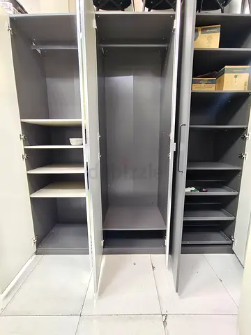 Three-door Grey Wardrobe with Shelves and Hanging Rail - Good Condition