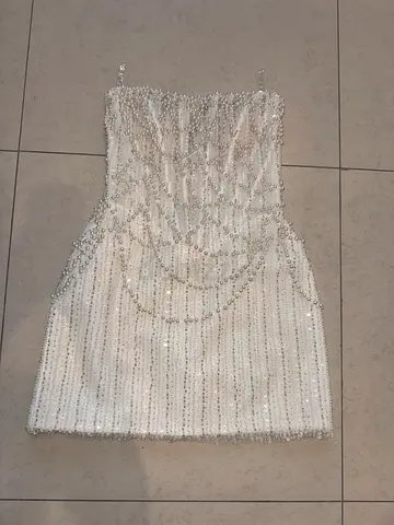 White beaded bridal/cocktail dress, knee-length, strapless from brand Rosie Etienne