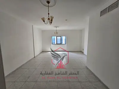 غرفتين وصالة مع خزائن في الحائط , شهر مجاني وجيم وصيانة مجانية طوال العام , موقع حيوي قريب من مخرج دبي