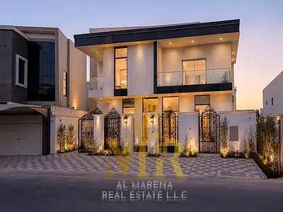 Luxury villa with private pool for sale in Al Yasmin - Ajman | Two floors and a roof, 6 bedrooms, price includes electricity, water and air conditioni