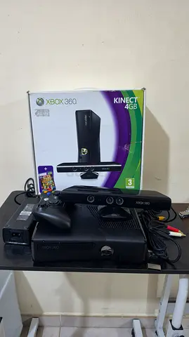 Xbox 360 like new with carton modded with games