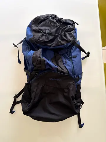 Large navy blue hiking backpack - used, roomy with multiple compartments