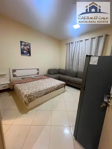 One-bedroom apartment with a living room, located directly off the Dubai exit.