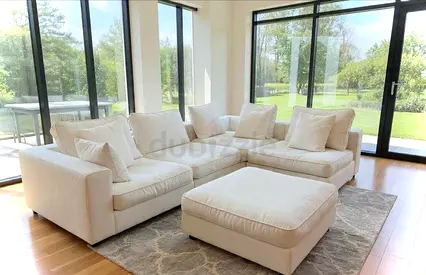 Looks great condition Marina home Feather filled Corner Sofa with Footstools