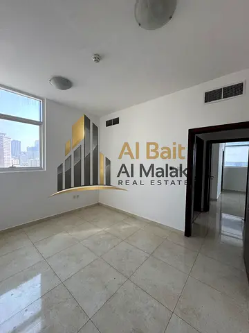 Spacious 2-Master-Bedroom Apartment for Annual Rent in Al Majaz 2 with Balcony, Open View, 3 Bathrooms, Central Air Conditioning and Free Parking, Off