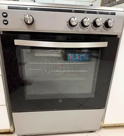 Stainless steel freestanding oven with gas hob - good working condition