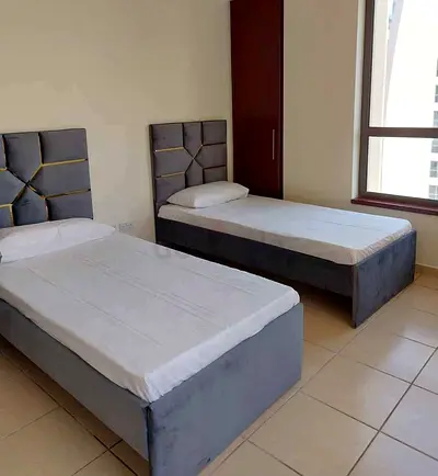 New Pair of single beds with upholstered headboards and mattress
