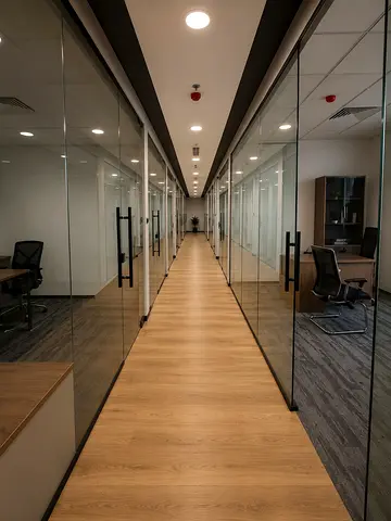 Fully furnished, EJARI-compliant office space with 24/7 access, utilities included, reception support, conference room, and ready-to-use workstations.
