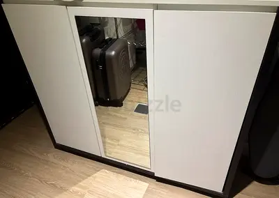 Compact white wardrobe cabinet with mirror — good condition