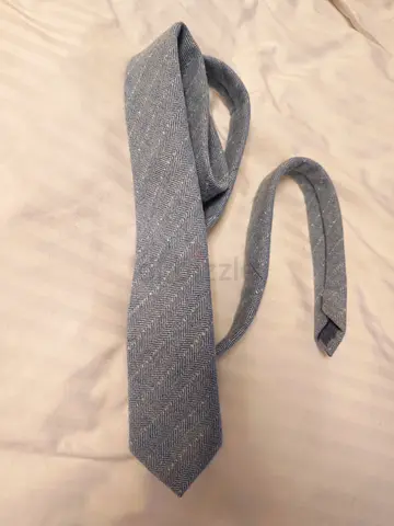 Light blue textured men's tie - slim style