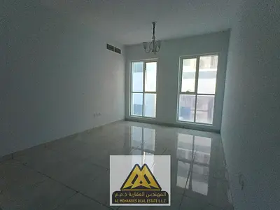 2BR apartment with living room for annual rent, first row on Ajman Corniche. Central AC, free landl