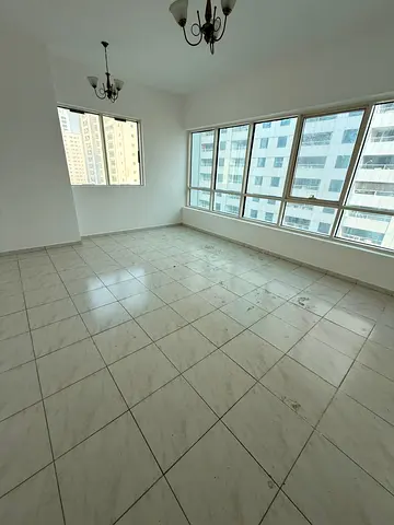 Stunning and very spacious 3-bedroom apartment with a living room in Al Taawun, in a prime location directly on Al Ittihad Road. If you are looking f
