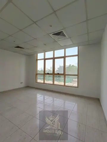 Annual rent in Al Majaz 2 on Jamal Abdul Nasser Street one bedroom apartment with open view bath kitchen central AC free AED 33000 in 4 or 6 payments