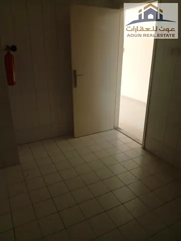 Two-bedroom apartment with a living room in Al Qasimia. Includes two bathrooms and a balcony. Price: 34,000 (payable in 4 to 6 installments), with one