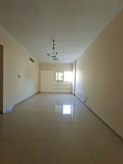 Spacious 2-Bedroom Apartment in New Muwaileh with Comfortable Living Room, Built-in Wardrobes, Parki