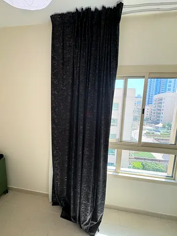 Black blackout curtain panel
