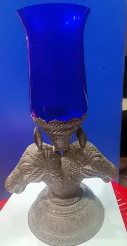 Blue glass vase on ornate metal stand-36cm height