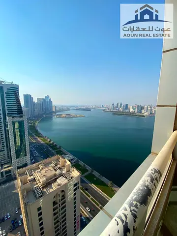 **2 Bedrooms + Living Room, Al Majaz 3 | Tower | Full Lake View | 1,750 sq. ft. | Parking, Gym, and Pool | 60,000 | 4 or 6 Installments**