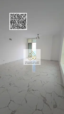 Three-bedroom apartment with a living room for annual rent in Al Waha Towers, overlooking Ajman Cre