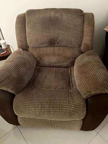 Comfortable brown fabric recliner armchair - good condition